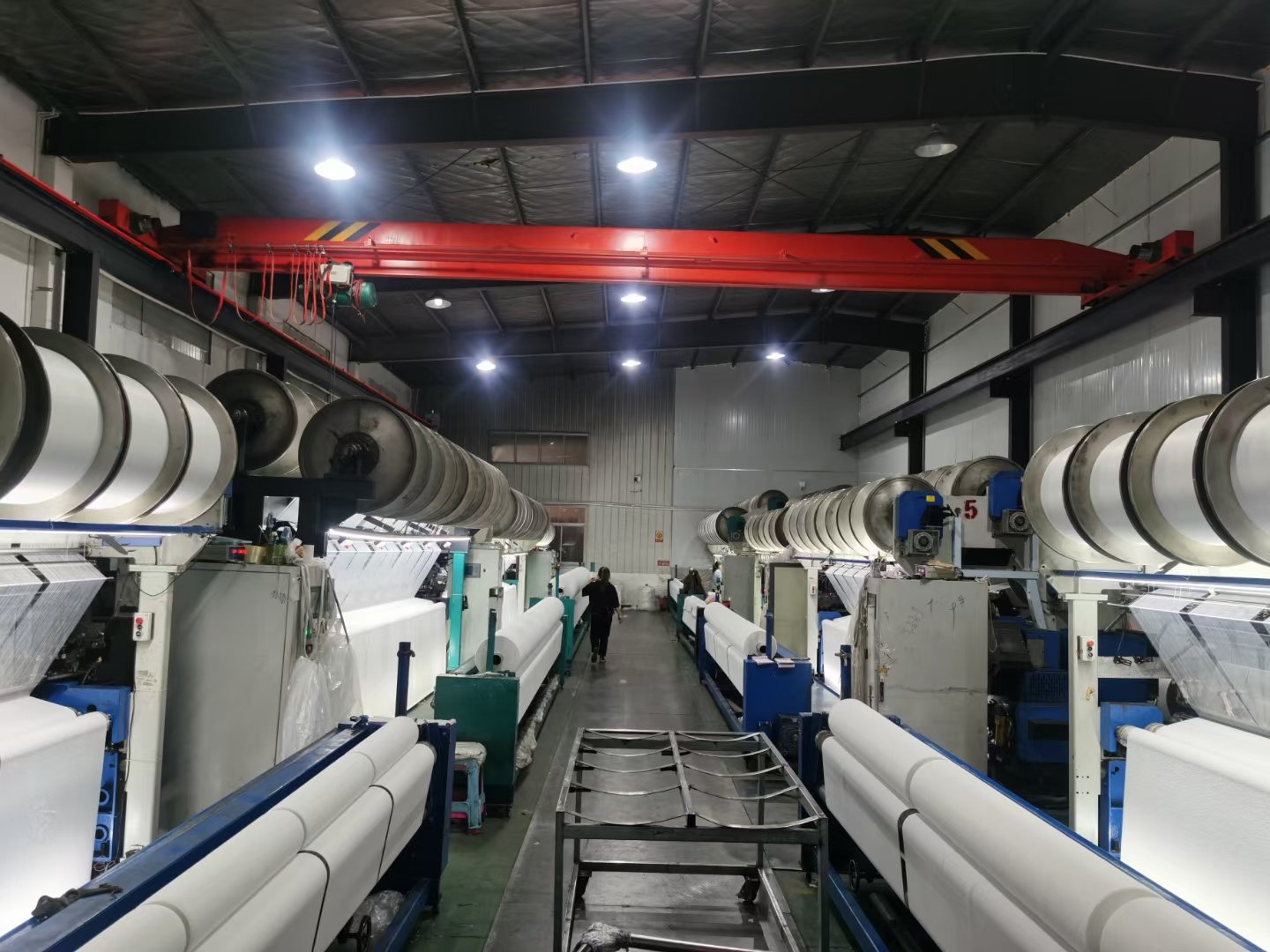 Fabric weaving process at custom towel factory