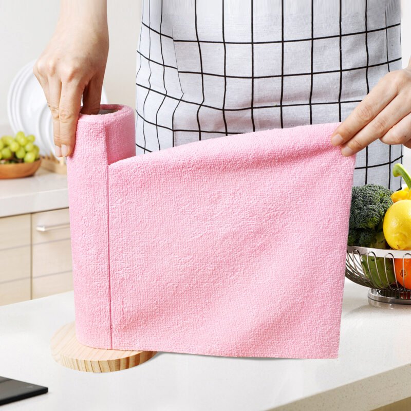 Pink microfiber cleaning cloth unrolled to show the sheet and fabric texture