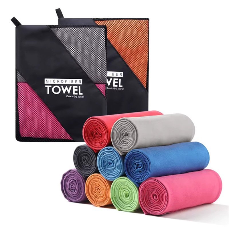 Packable beach towel in pouch