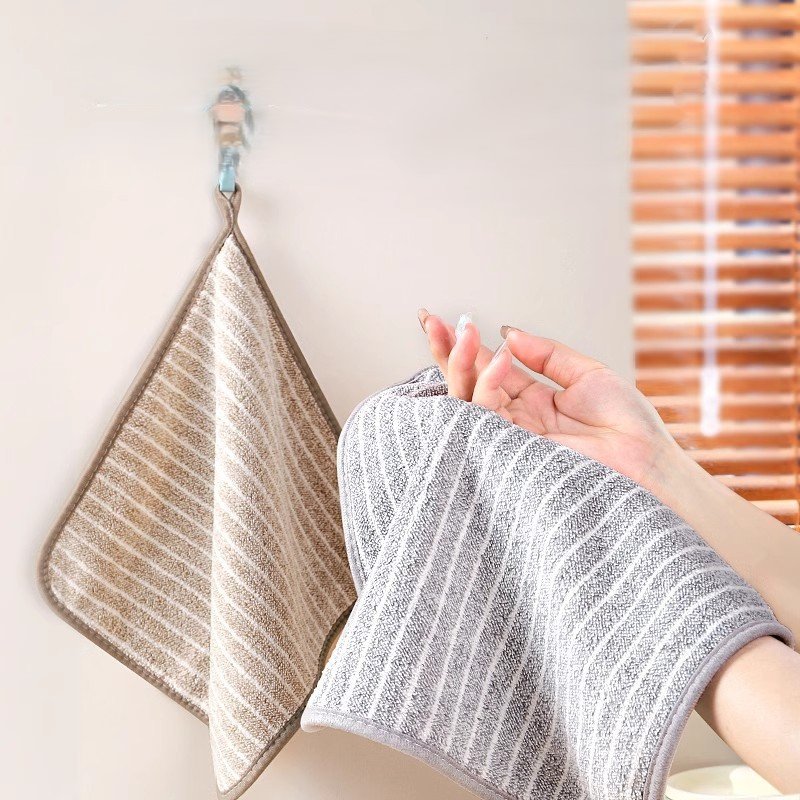 Microfiber towels being used with safe cleaning solutions