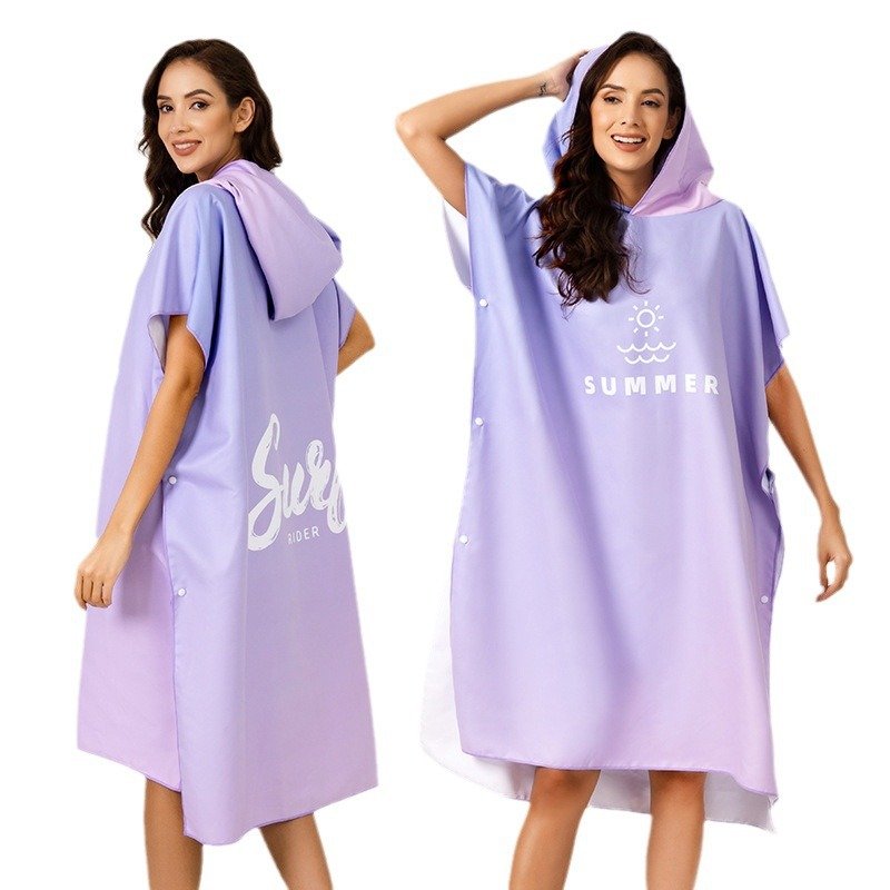 cotton surf poncho being used on the beach