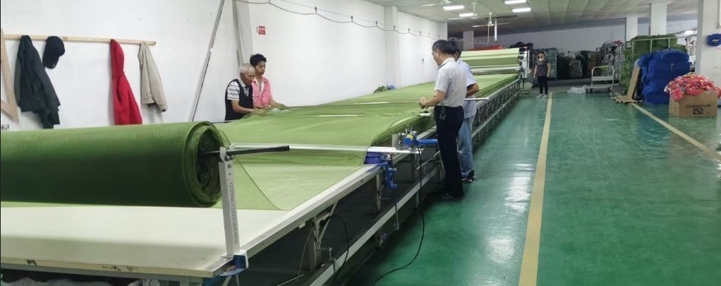Fabric being prepared and cut for textile products