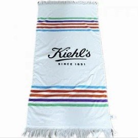 White fringed towel with colored stripes and a printed Kiehl's logo